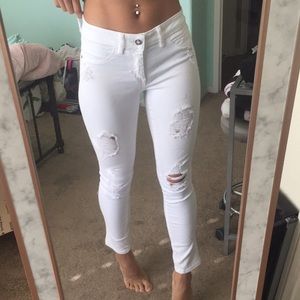 Bebe white ripped jeans